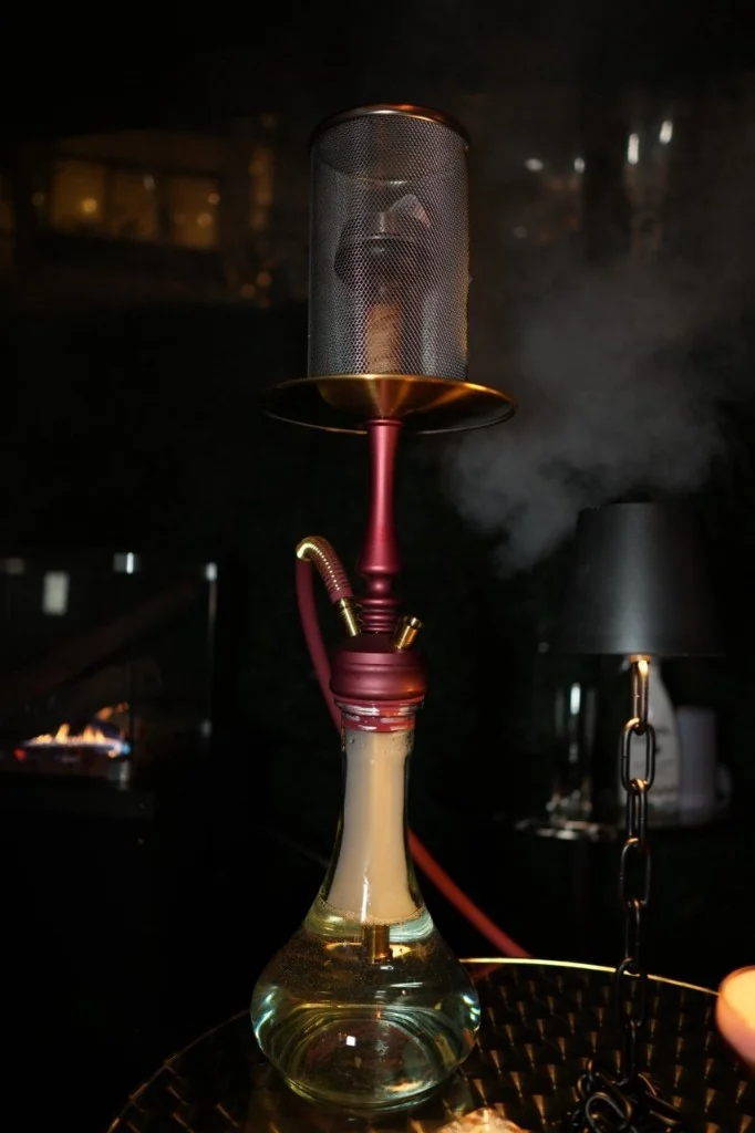 Night terrace hookah beside the fire